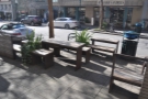The view from the window, including the outside seating area on Pacific Avenue.