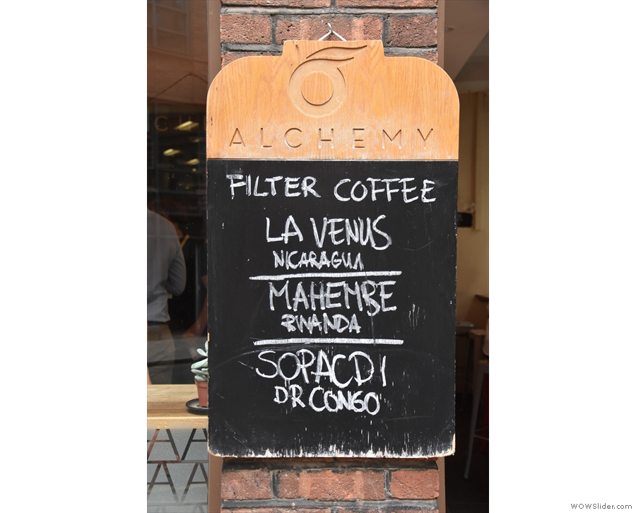 The filter coffee options are chalked up on a board by the door...