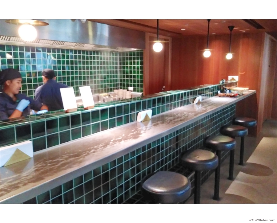 ... complete with noodle bar, where you can sit at the counter.