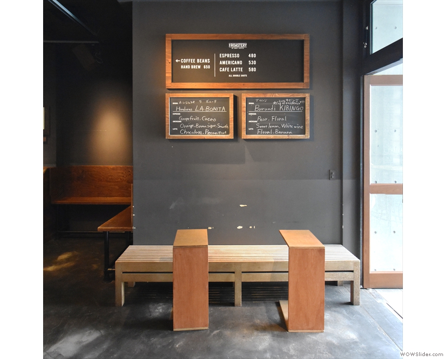 Off to the right is this simple bench-seat, with two stand-alone tables under the menu.