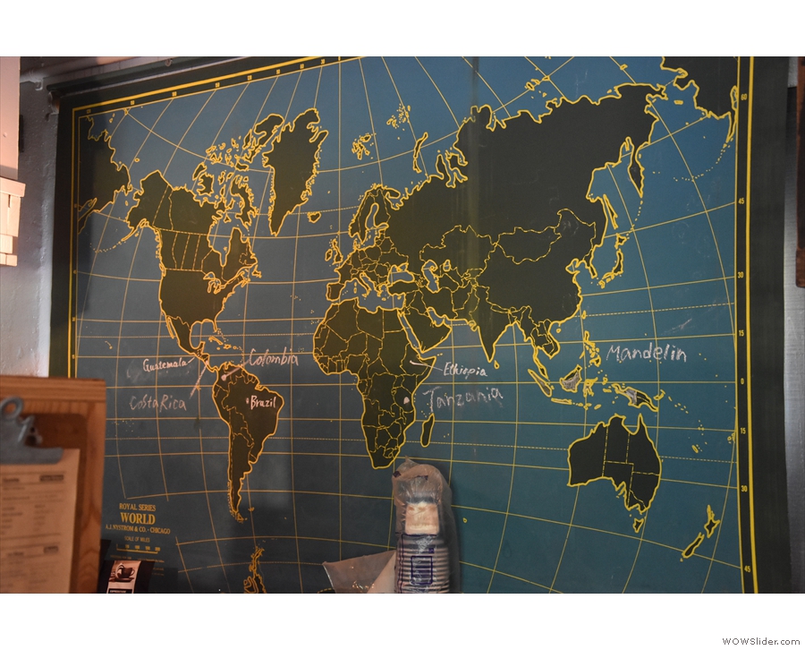 Meanwhile, a map on the wall behind the counter shows where the coffee is from.