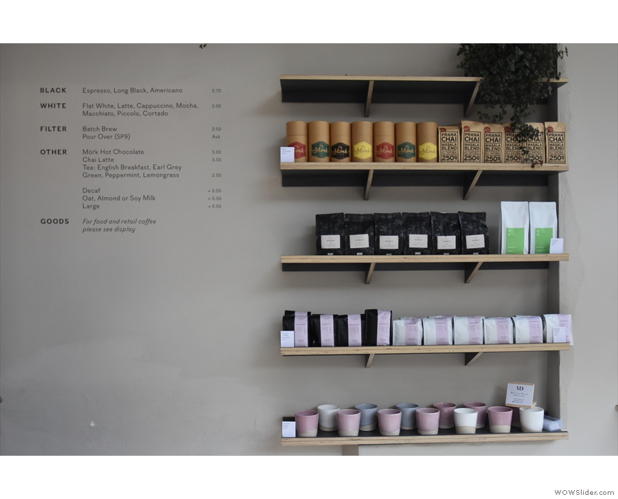 Rosslyn Coffee has a strong retail selection on the back wall to the right of the counter.