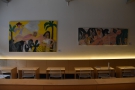 The decor in Mother Espresso is fairly minimal, but paintings grace the left-hand wall.