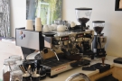 The La Marzocco Linea espresso machine is at the front of the counter...