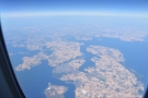 We fly across the southern tip of Denmark by the German border...