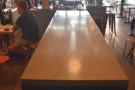 The communal table, as seen from the back.