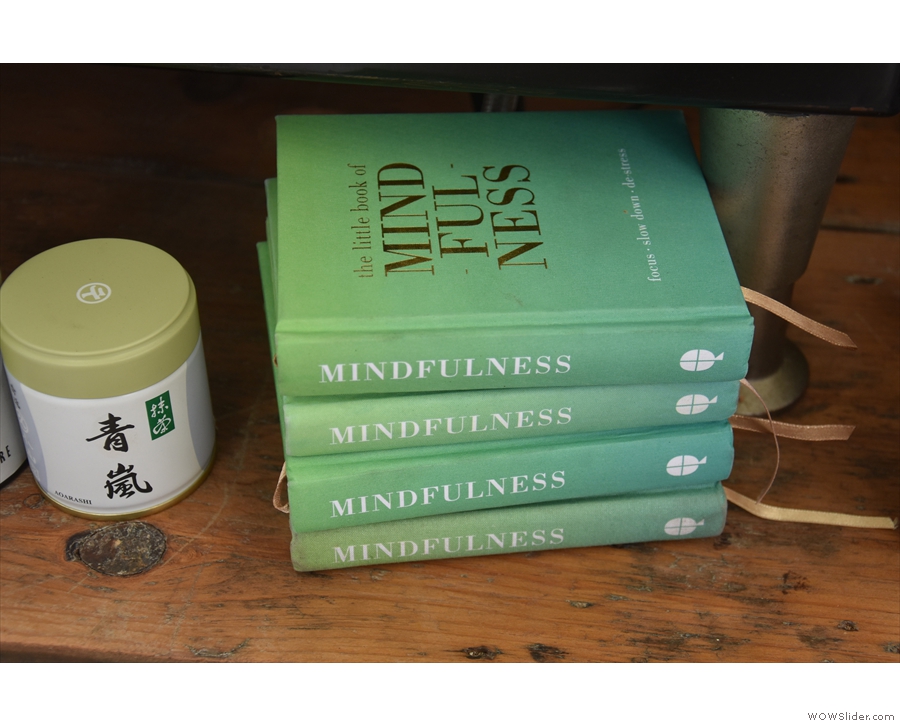 ...  and, as well as coffee, he sells these Little Books of Mindfulness...