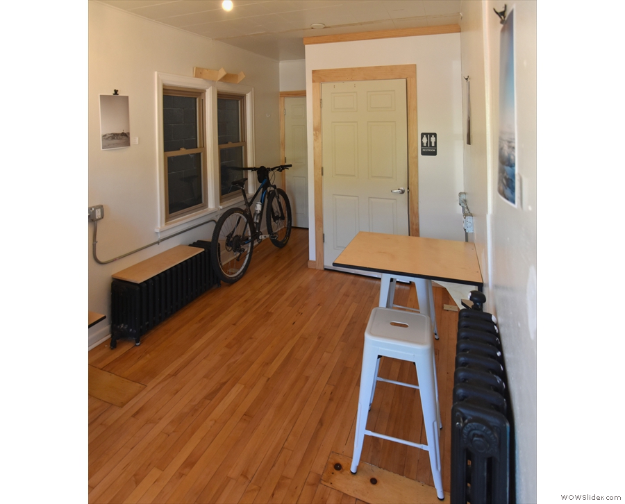 This is a large, spacious room, with bike storage and a rest-room at the back.