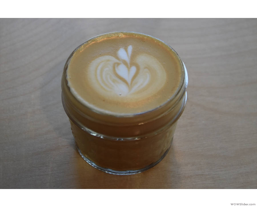 My cortado, in a lovely, small glass jar.