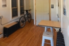 This is a large, spacious room, with bike storage and a rest-room at the back.