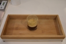 My espresso, served on a wooden tray. Normally there'd be a glass of soda water too.