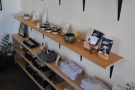There are various pieces of pottery, plus the usual merchandising, on the retail shelves...