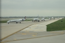 A queue of American Airlines planes waiting to take off.