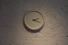 Minimalist clock on a minimalist wall.