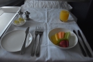 ... my table was laid for breakfast, using a proper table cloth! First course was fruit...