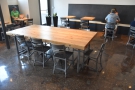 There's more seating, dominated by this central, communal table.