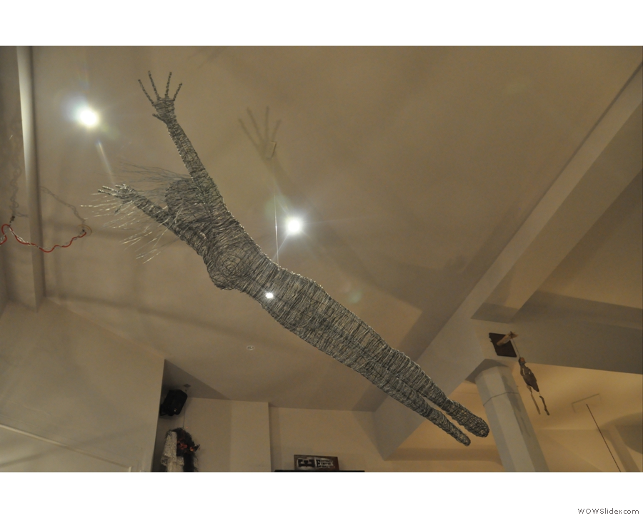 A flying lady hanging from the ceiling. Every coffee shop needs one! It's Bristol's Wild at Heart.