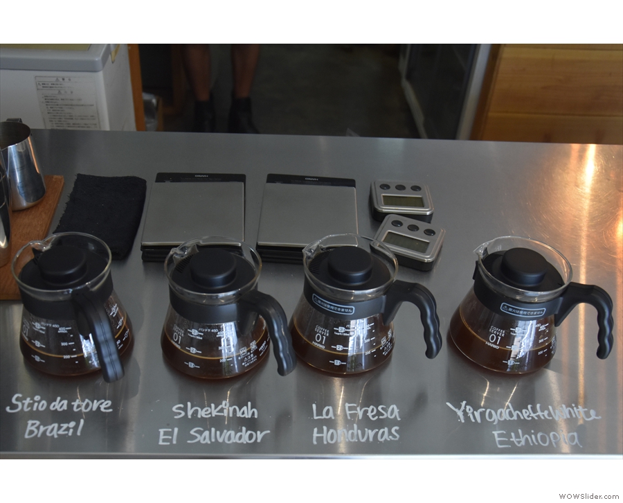 The carafes on the counter hold samples of each of the four single-origin filters...