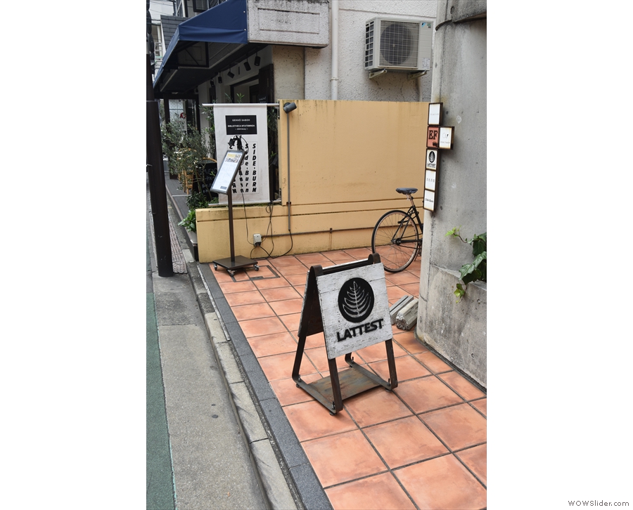 On a (relatively) quiet street in Omotesando, Tokyo, an A-board catches the eye.