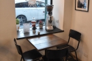 ... and a three person table, like this one, by the front wall (in this case, window).