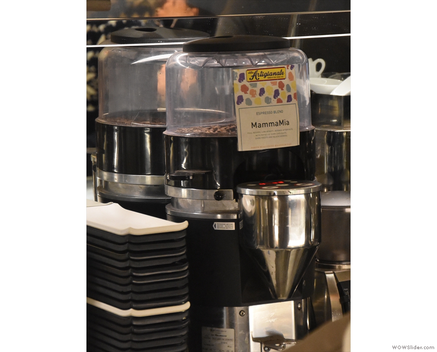 ... while on the other side of the espresso machine, there's a fourth grinder with the...