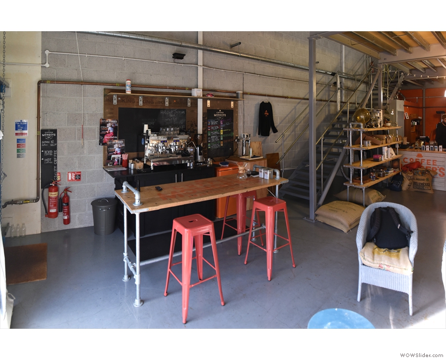 The layout's simple. A counter at the front on the left has the espresso machine...