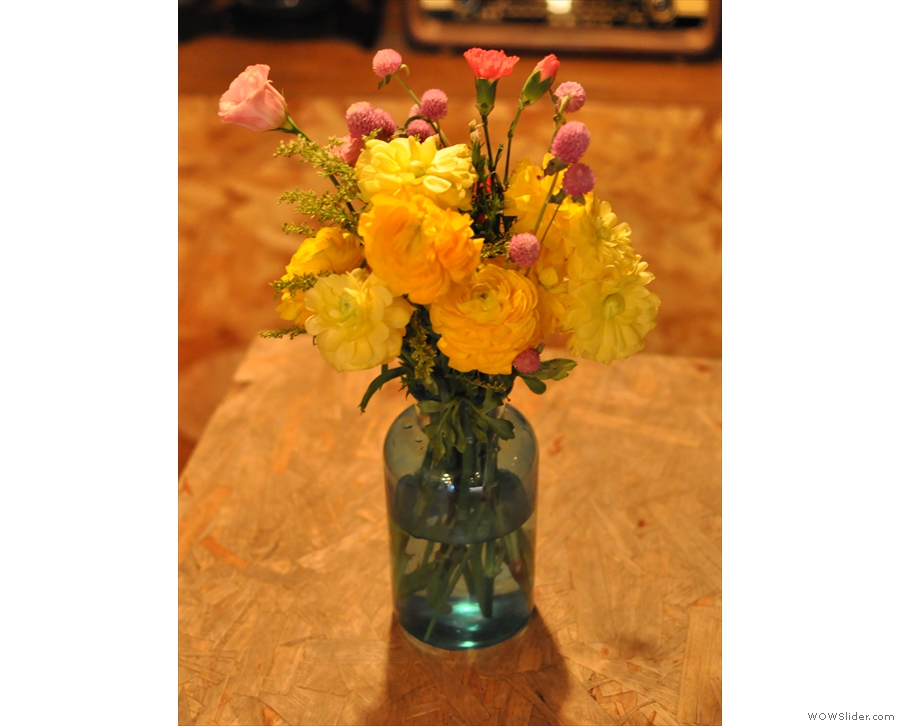 Meanwhile, nice touches abound, such as these pretty flowers on the table...