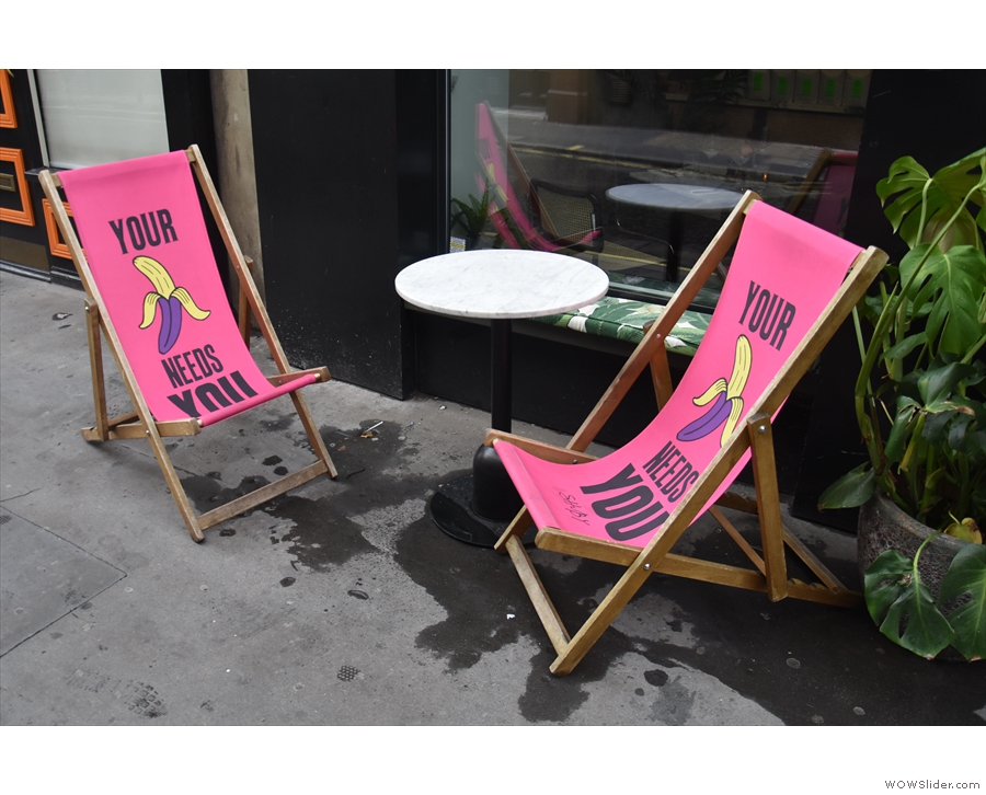 There's a solitary table and the trademark 'Your Banana Needs You' deckchairs outside.
