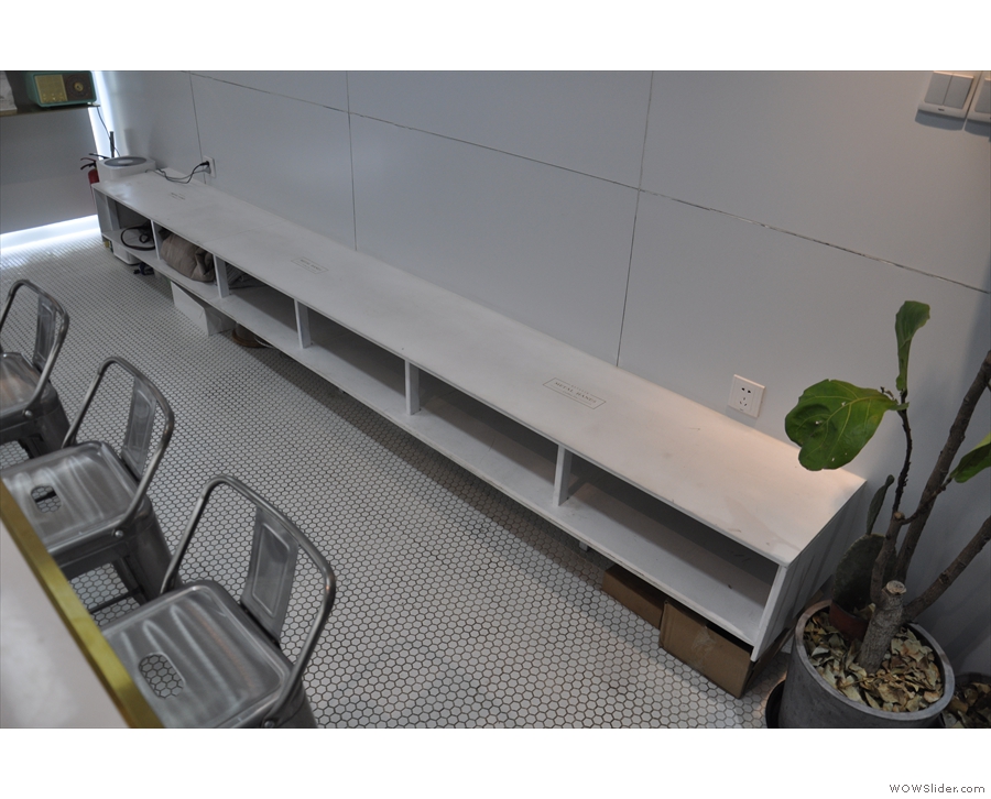 You can also sit on the low bench (with storage space underneath) on the right.