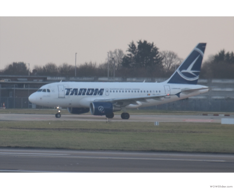 All the while, this Airbus A318 from Tarom was waiting to go to Bucharest.