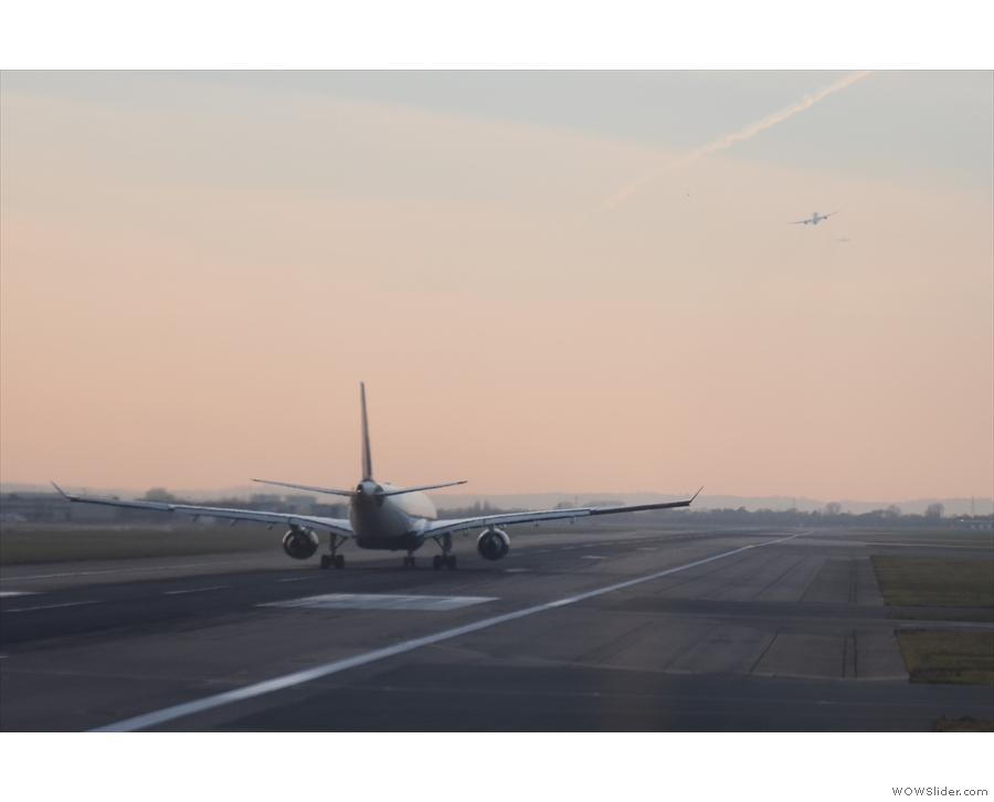 As we trundle onto the runway behind it, off it goes, the previous British Airways flight...