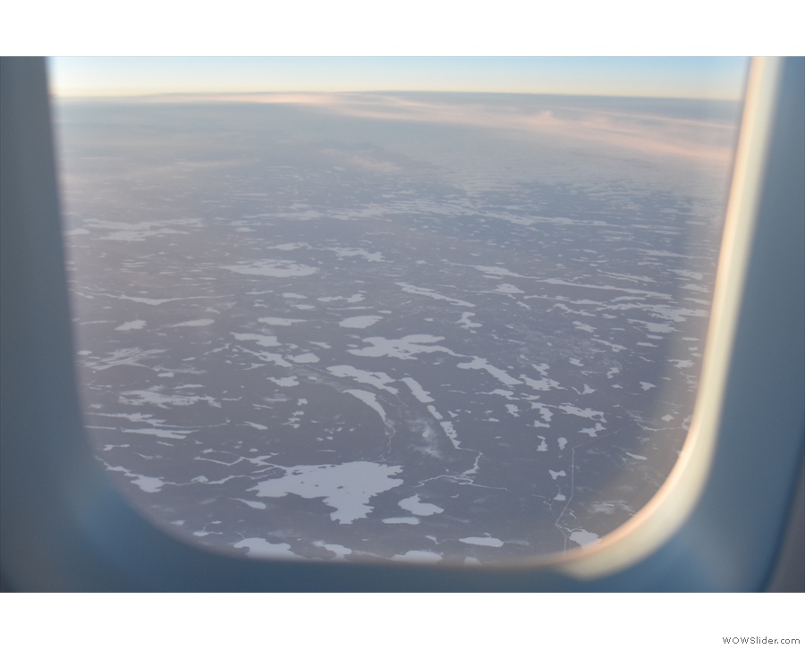 Down below, it's an ever-changing lanscape of frozen lakes...