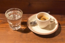 On my return in 2019, I had a Burundi espresso, served with a glass of sparkling water.
