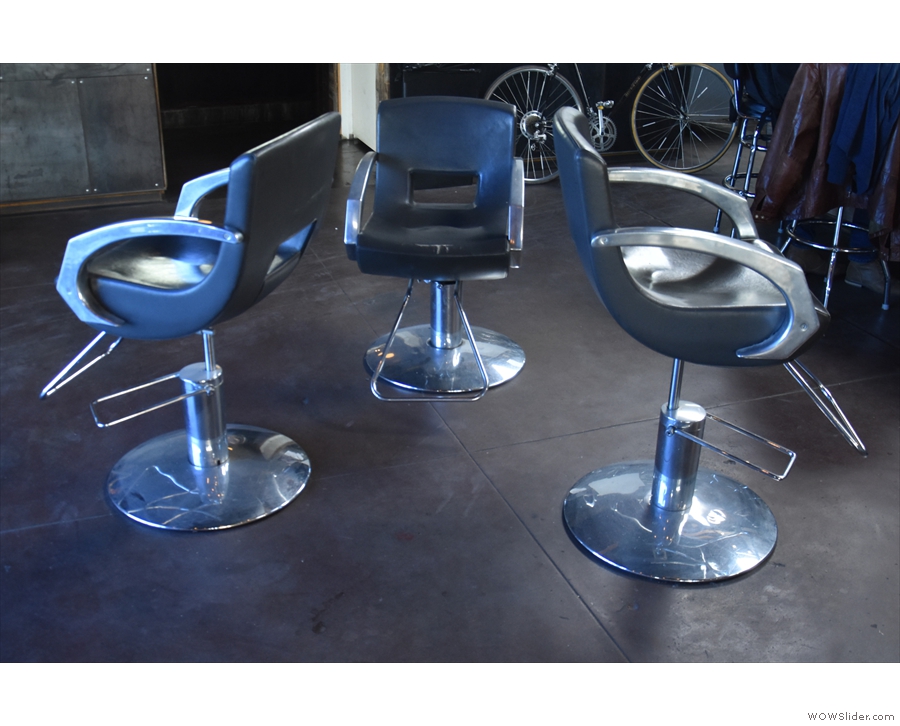 ... and this strange arrangement of three barber-style chairs in the centre.