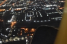 The lights of O'Hare quickly dropped away below us as we climbed...
