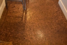 It also pays to look down. The floor of the back room is decorated by 20,000 pennies!