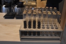 There are also test tubes down here with pre-dosed shots of the coffee beans.