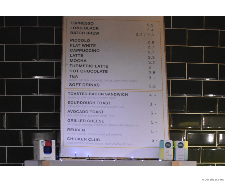 The concise drinks menu is at the top, with an equally concise food menu below.