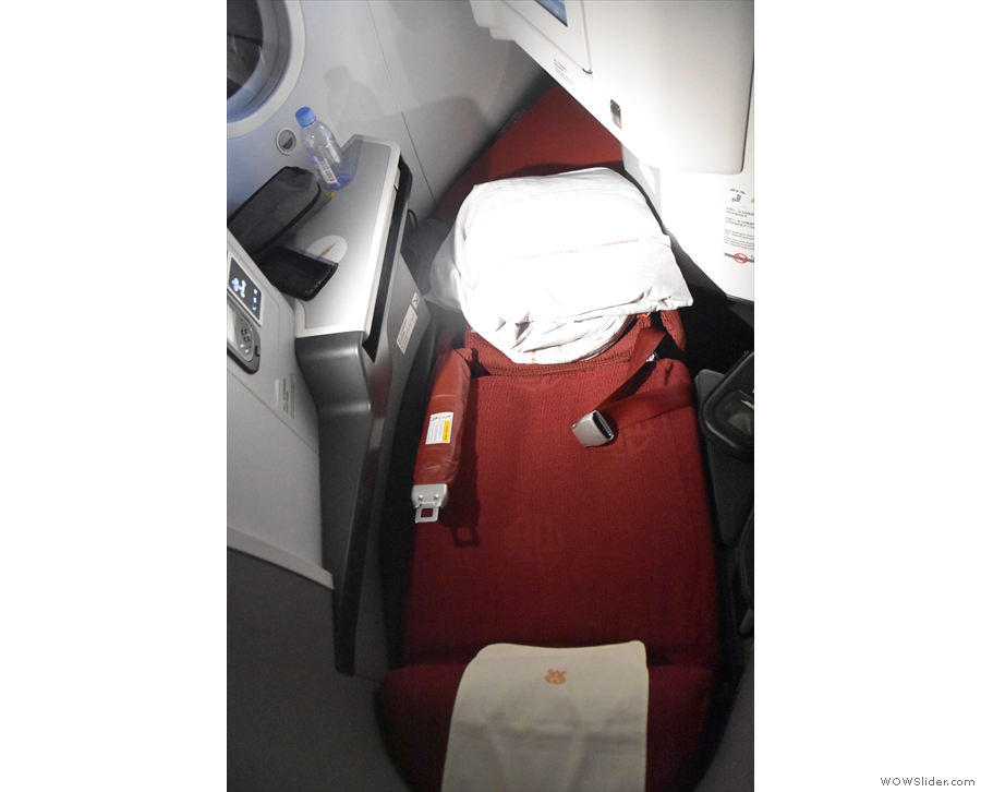 ... in business class, where the seats fold down into beds, which makes...