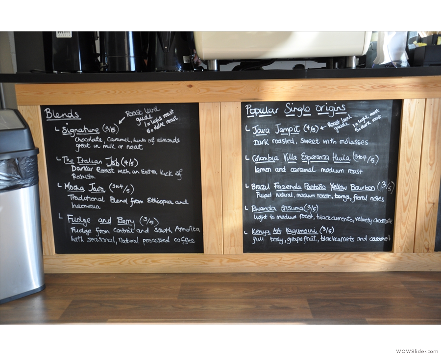 Rave's current coffee offerings (from the roastery) are chalked up on the boards.