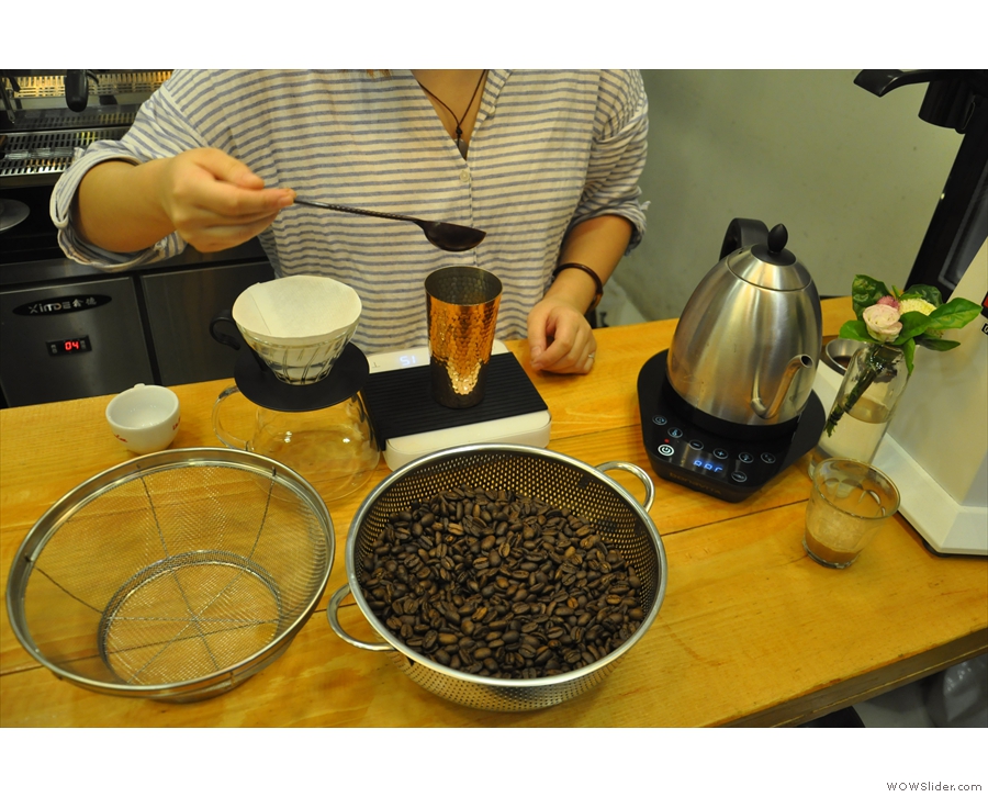 You can't get coffee fresher than this. The newly-roasted coffee is weighed out...