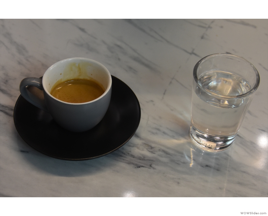 My espresso, served with a glass of water, of course...