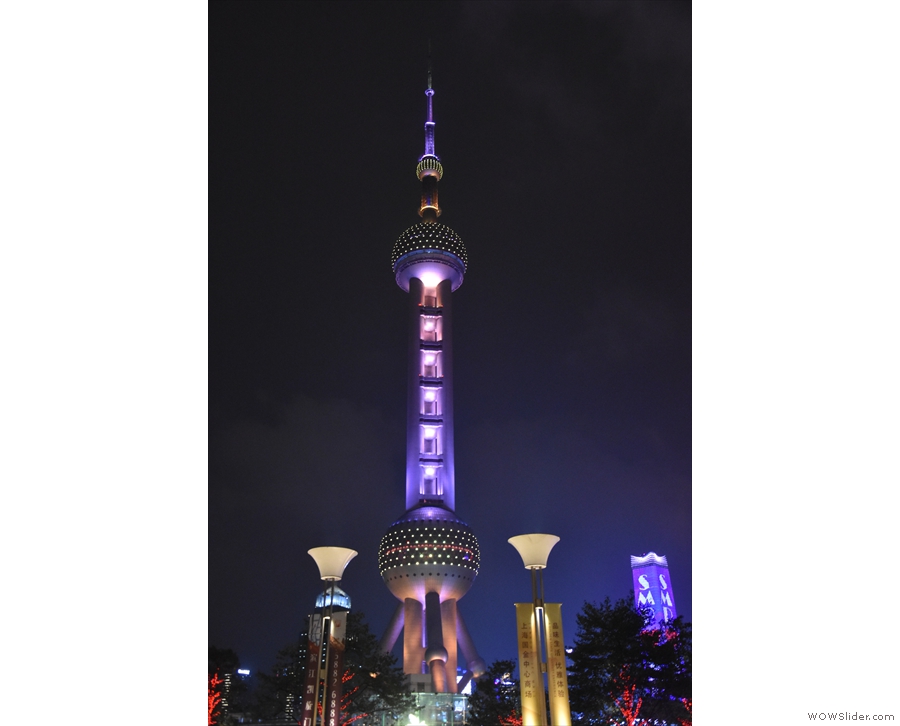 Option 2: outside the front of the mall by the Oriental Pearl Tower, seen here at night.