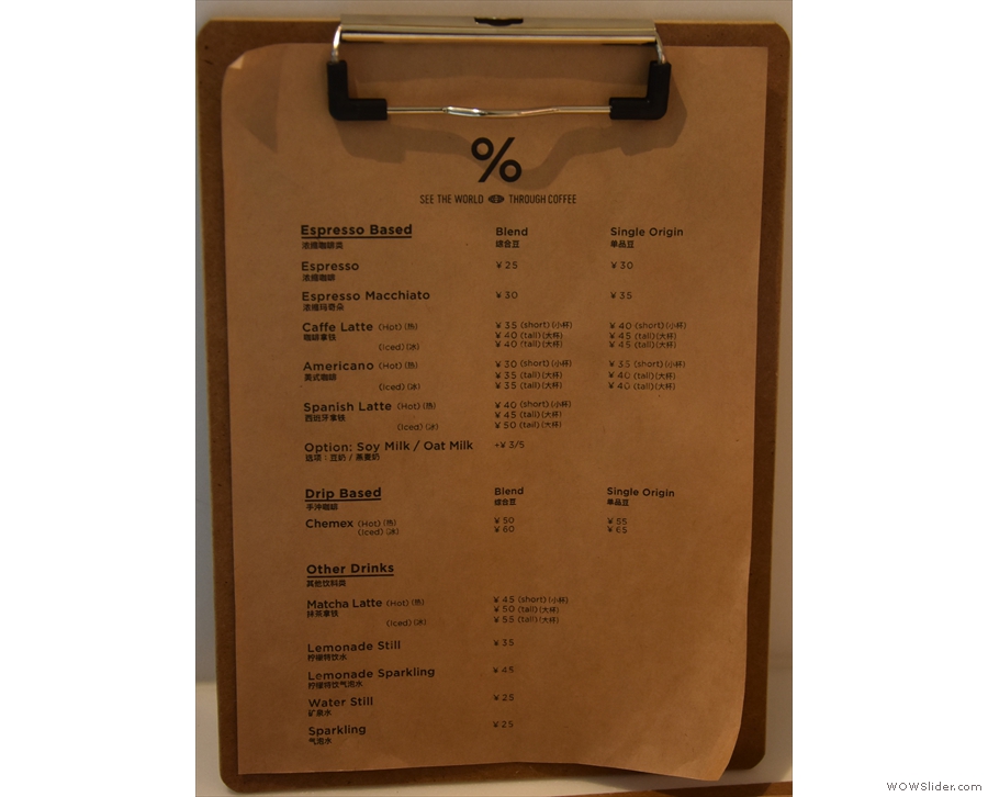 The menu is on a clipboard with the different drink options...