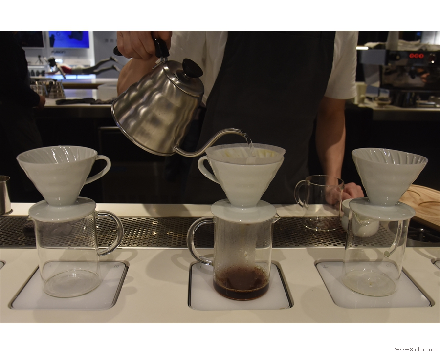 As before, water is slowly added to the V60 with a steady...