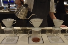 Water is slowly added to the V60 with a steady...
