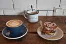 This was mine. A flat white and a cinnamon roll.