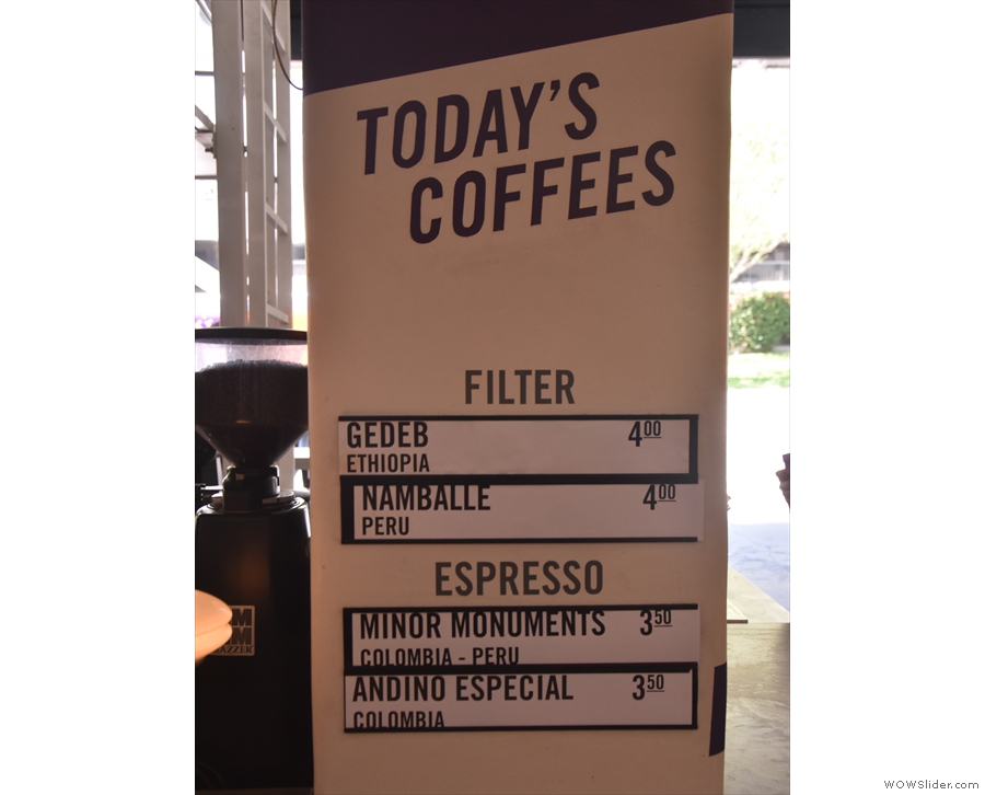 Meanwhile, the current coffee choices are posted up on the pillars.