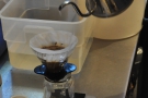 ... the V60 is slowly filled. Here we're a minute in and 97g of water has been added.