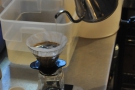 The pouring continues as the V60 continues to be filled.
